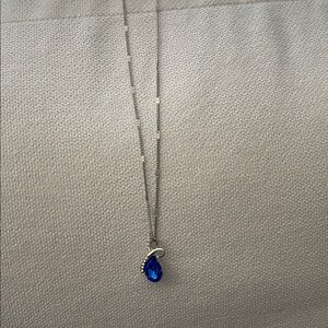 Silver  Necklace with Blue sapphire Pendant and clear rhinestones.